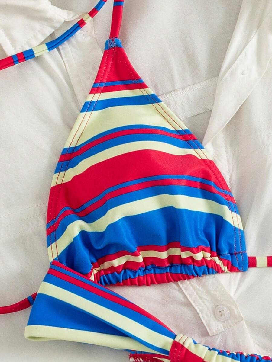 Women's striped halter two-piece swimsuit featuring a lace-up triangle top with removable padding and high-cut low-waist bikini bottoms.