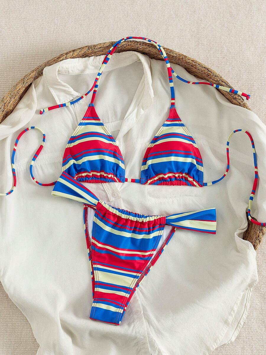 Women's striped halter two-piece swimsuit featuring a lace-up triangle top with removable padding and high-cut low-waist bikini bottoms.