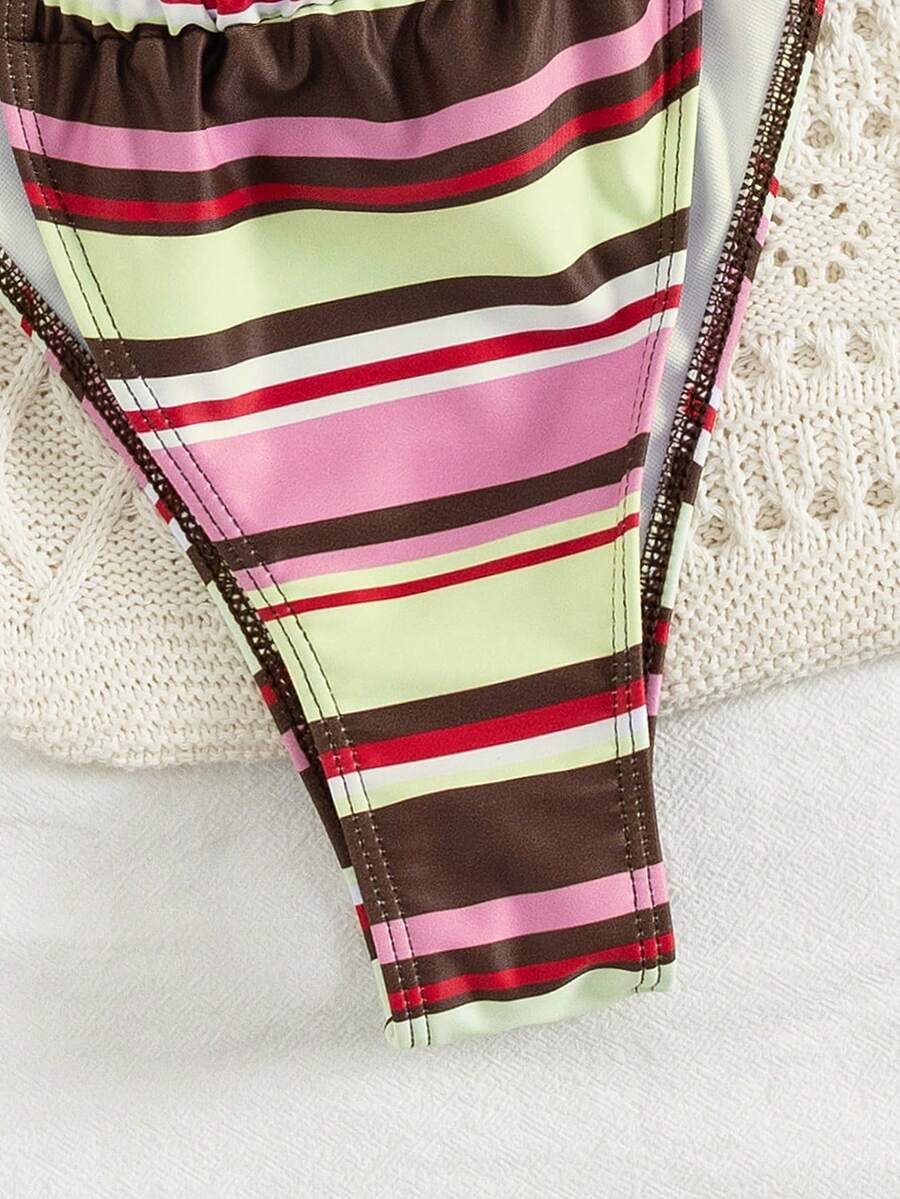 Women's striped halter two-piece swimsuit featuring a lace-up triangle top with removable padding and high-cut low-waist bikini bottoms.