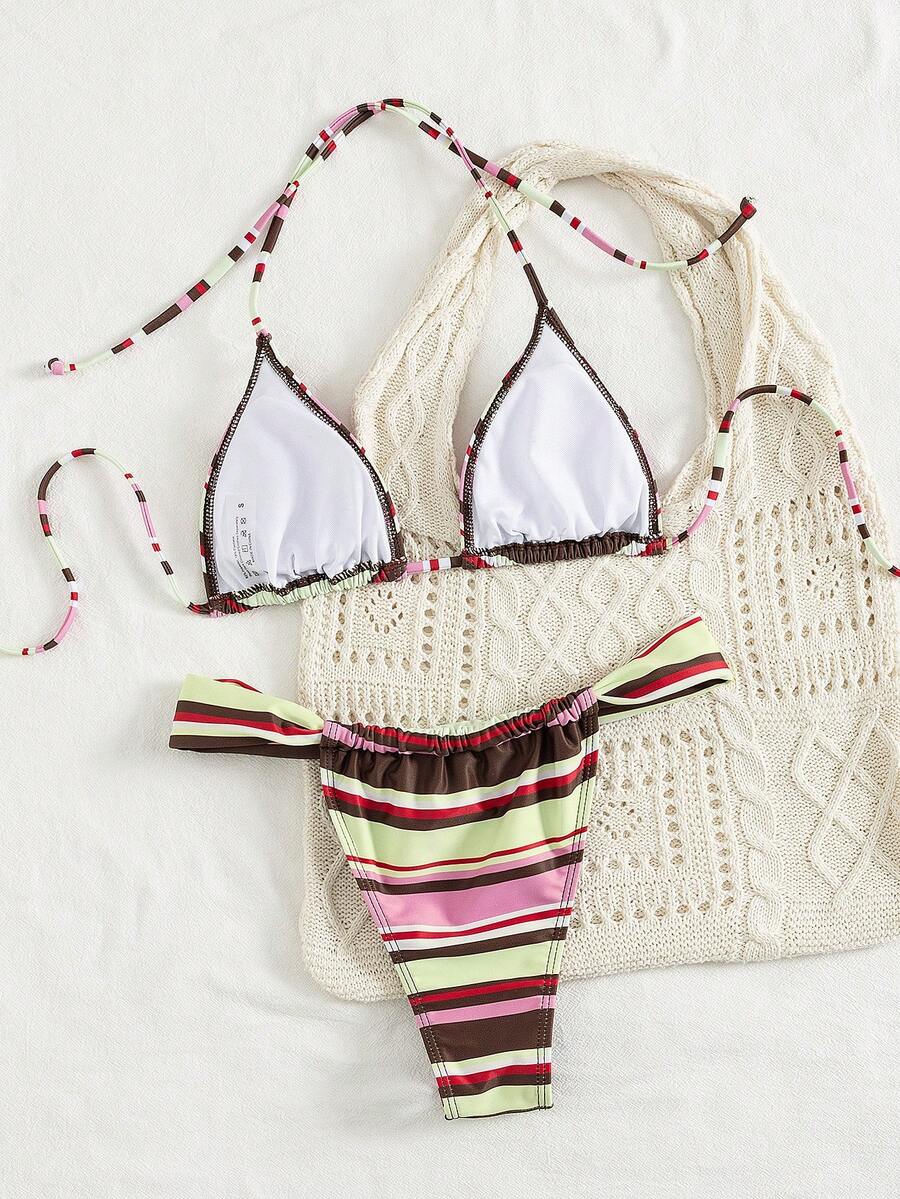 Women's striped halter two-piece swimsuit featuring a lace-up triangle top with removable padding and high-cut low-waist bikini bottoms.