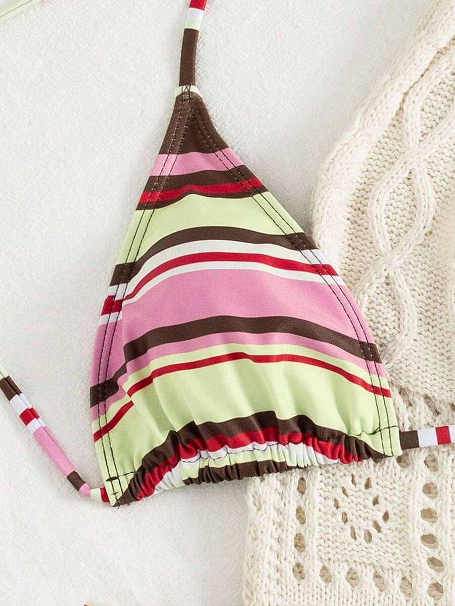 Women's striped halter two-piece swimsuit featuring a lace-up triangle top with removable padding and high-cut low-waist bikini bottoms.