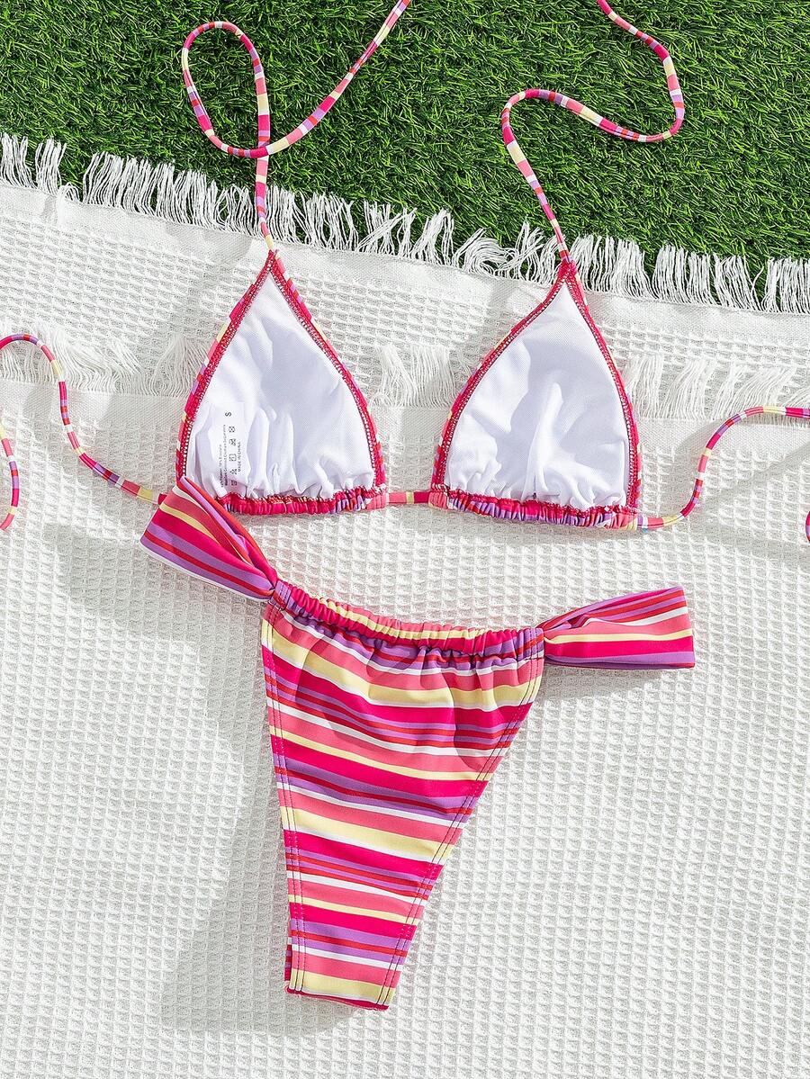 Women's striped halter two-piece swimsuit featuring a lace-up triangle top with removable padding and high-cut low-waist bikini bottoms.
