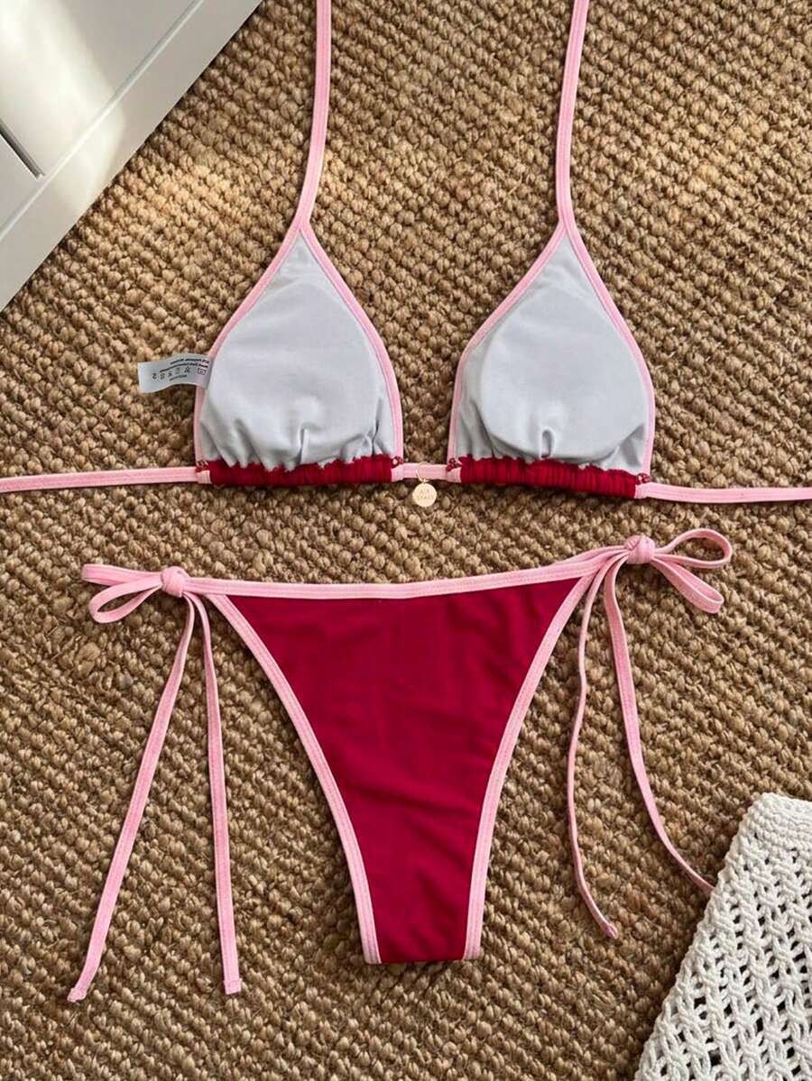 Women's high waist 2-piece triangle bikini set featuring colorblock trim, halter neckline, wireless bra with removable padding, and tie-side bottoms.