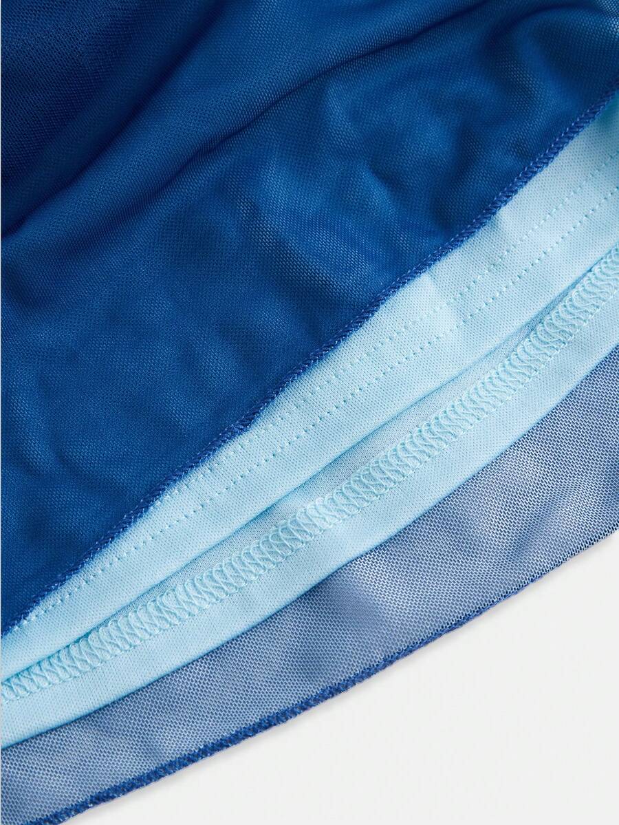 Apricot tween girls sleeveless halter cami dress with appliques, bow front, zipper detail, high waist, flared hem, and short slim fit design.