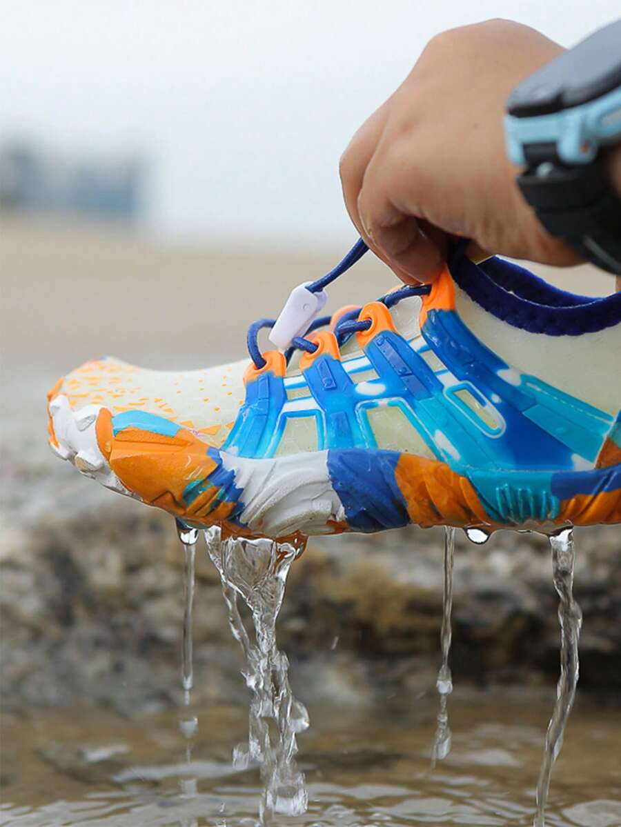 Apricot children's water shoes featuring slip-on fabric uppers, drawstring details, and rubber soles for beach play.