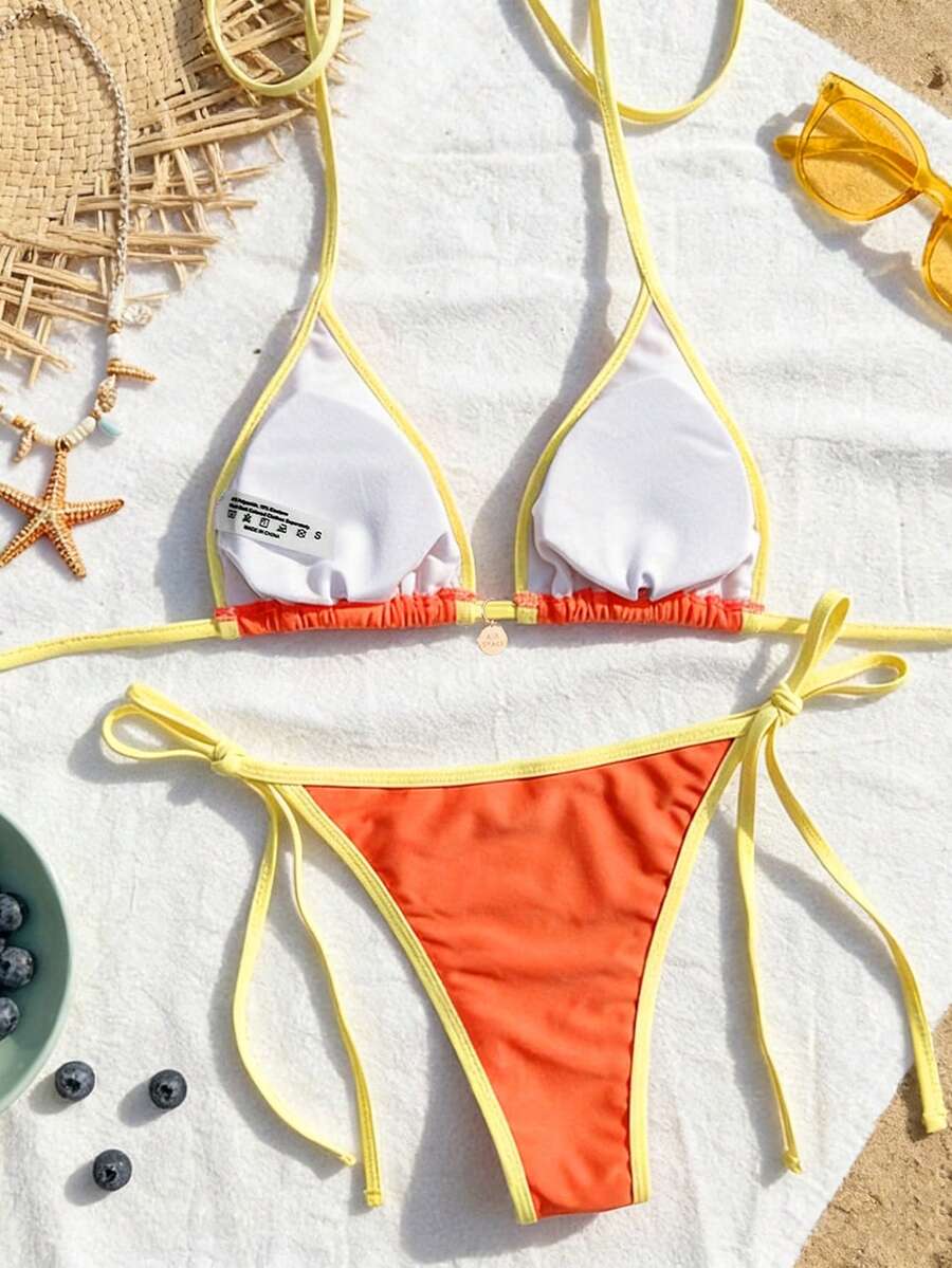 Women's high waist 2-piece triangle bikini set featuring colorblock trim, halter neckline, wireless bra with removable padding, and tie-side bottoms.