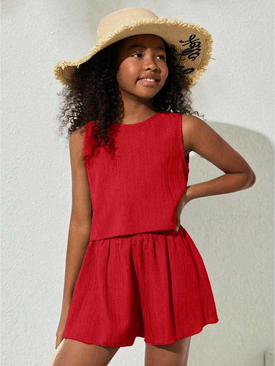 Tween girls army green casual outfit featuring a sleeveless round neck top with button details paired with matching woven loose shorts.