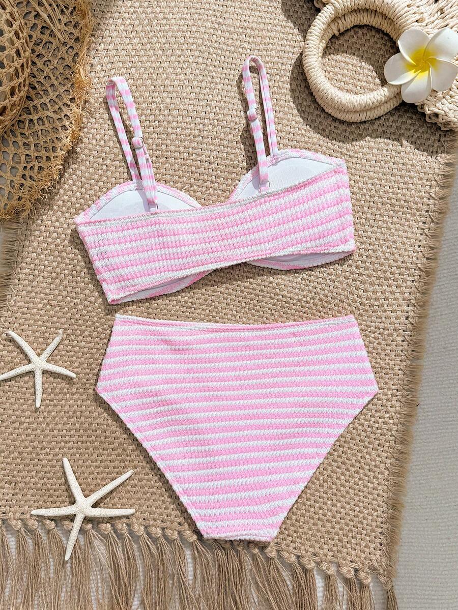 Tween girls pink and white striped two-piece bikini set with spaghetti strap bandeau top, starfish decor, and high waist swim bottoms for beach and vacation wear