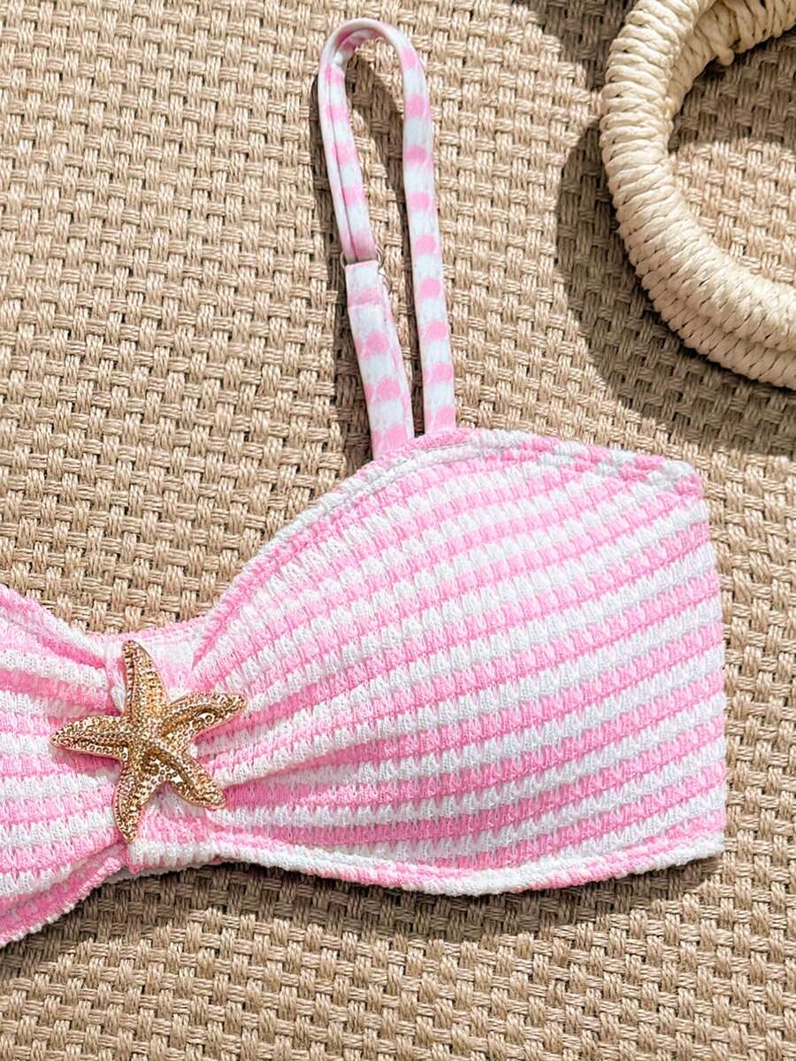 Tween girls pink and white striped two-piece bikini set with spaghetti strap bandeau top, starfish decor, and high waist swim bottoms for beach and vacation wear