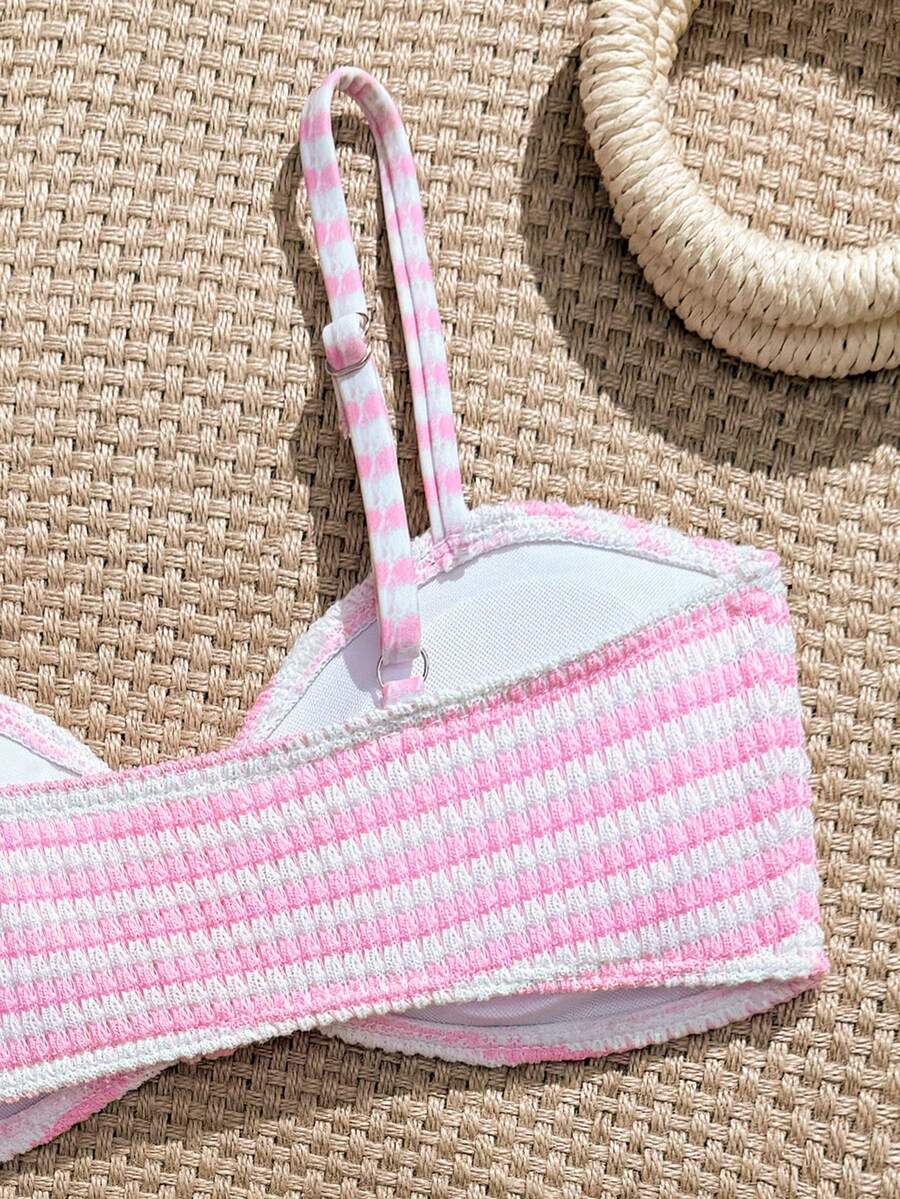 Tween girls pink and white striped two-piece bikini set with spaghetti strap bandeau top, starfish decor, and high waist swim bottoms for beach and vacation wear