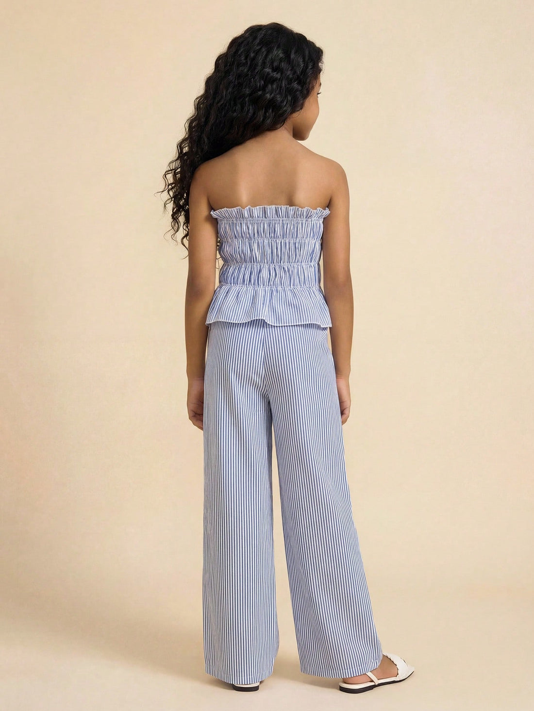 Tween girls casual tube top and elastic waist pants set with shirred ruffle details, strapless short top, and long pants in multicolor styling.
