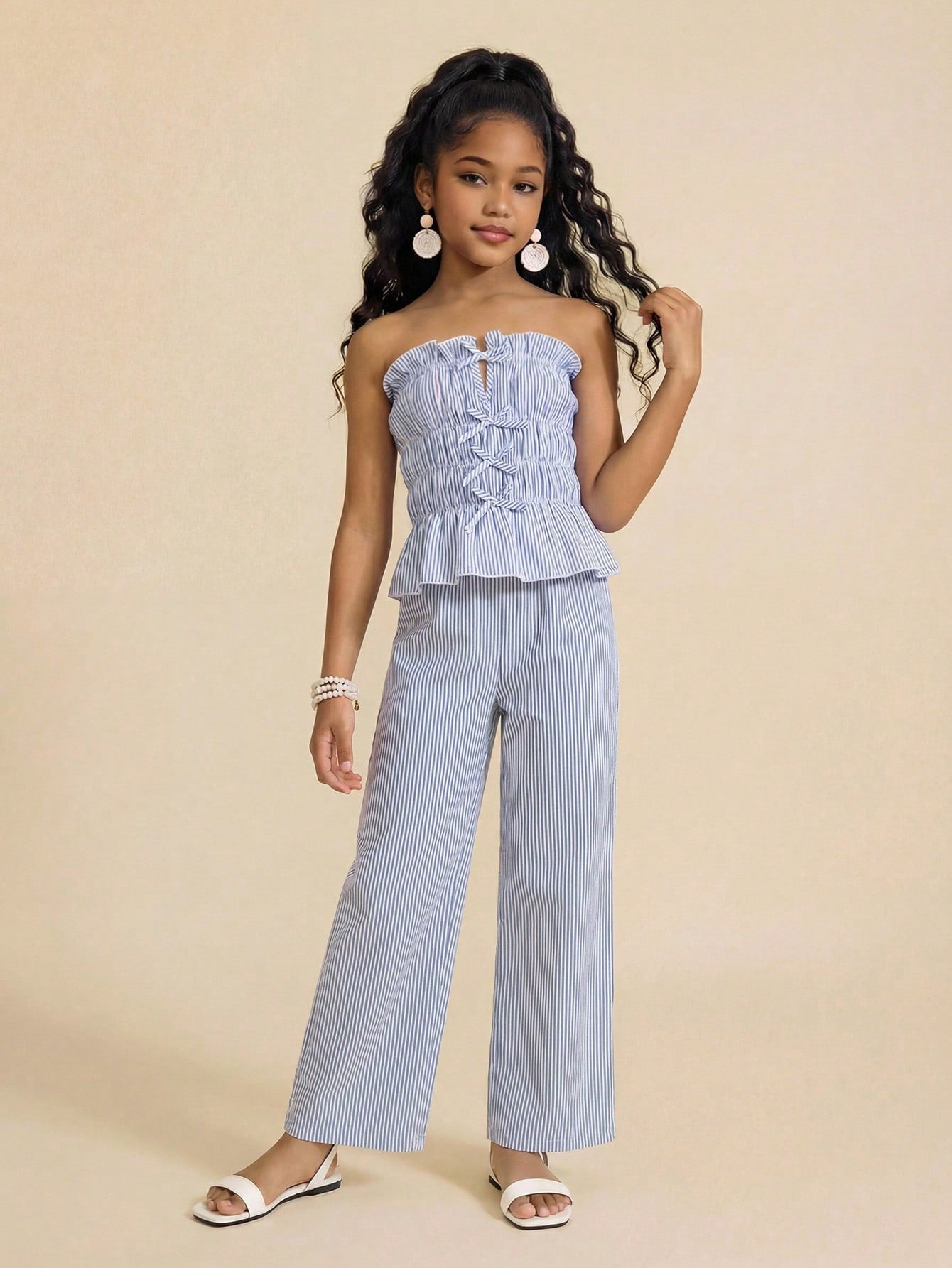 Tween girls casual tube top and elastic waist pants set with shirred ruffle details, strapless short top, and long pants in multicolor styling.
