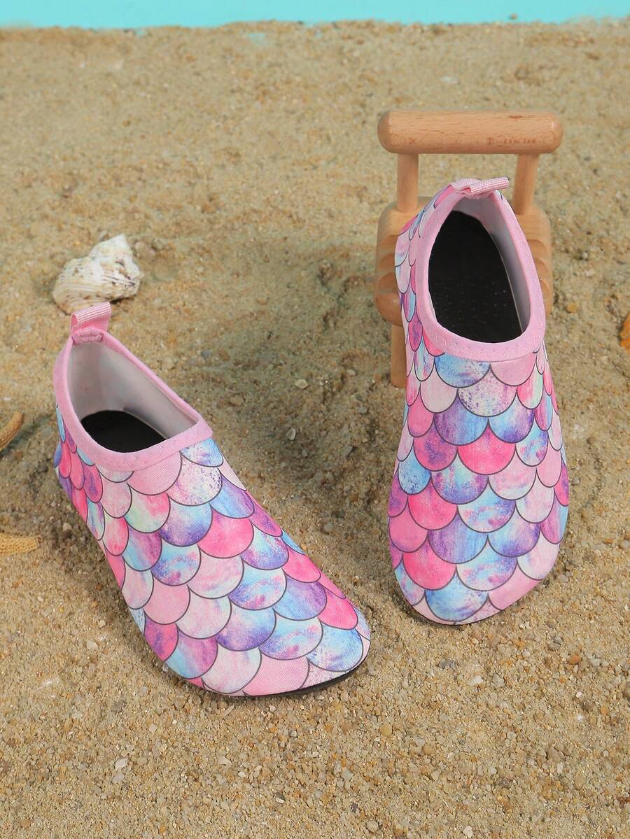 Pink kids quick-dry slip-on water shoes with breathable upper and non-slip TPR outsole.