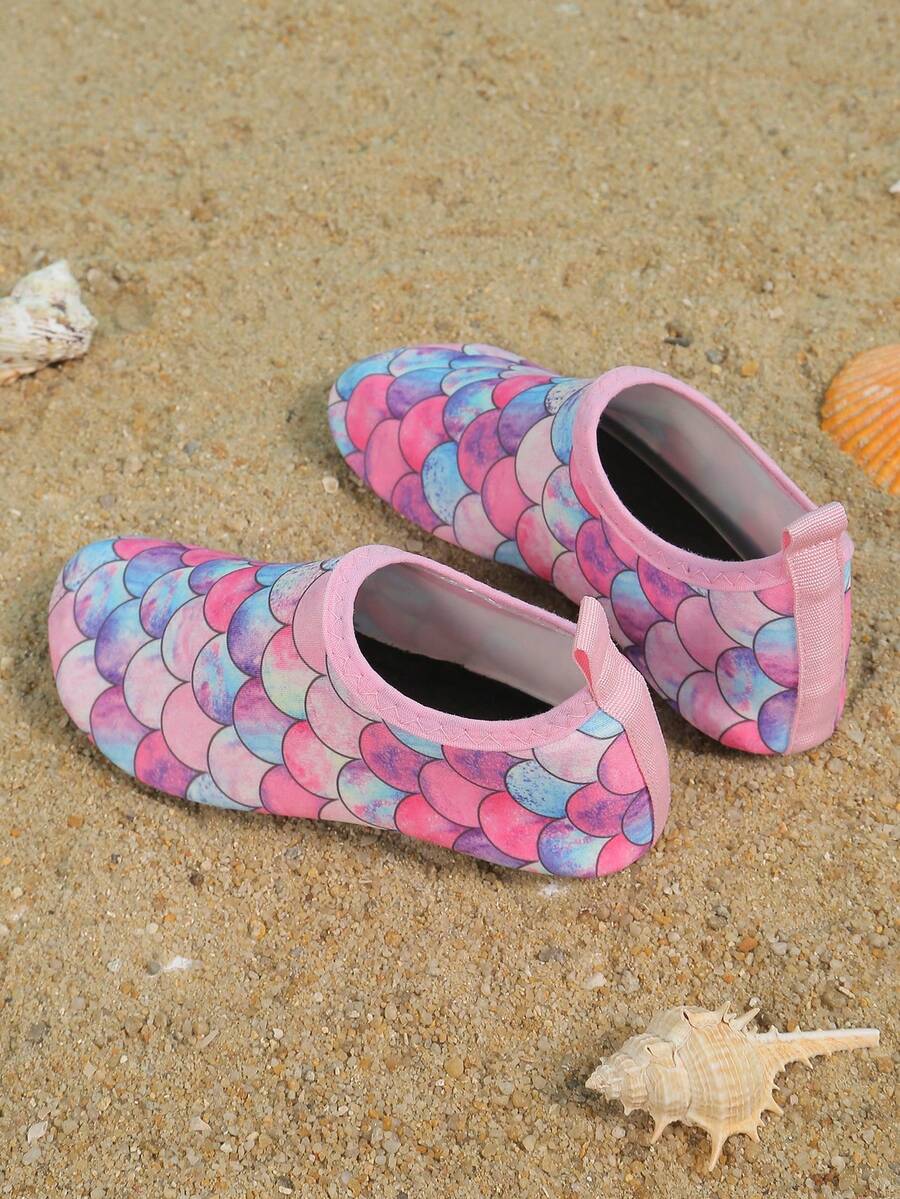 Pink kids quick-dry slip-on water shoes with breathable upper and non-slip TPR outsole.