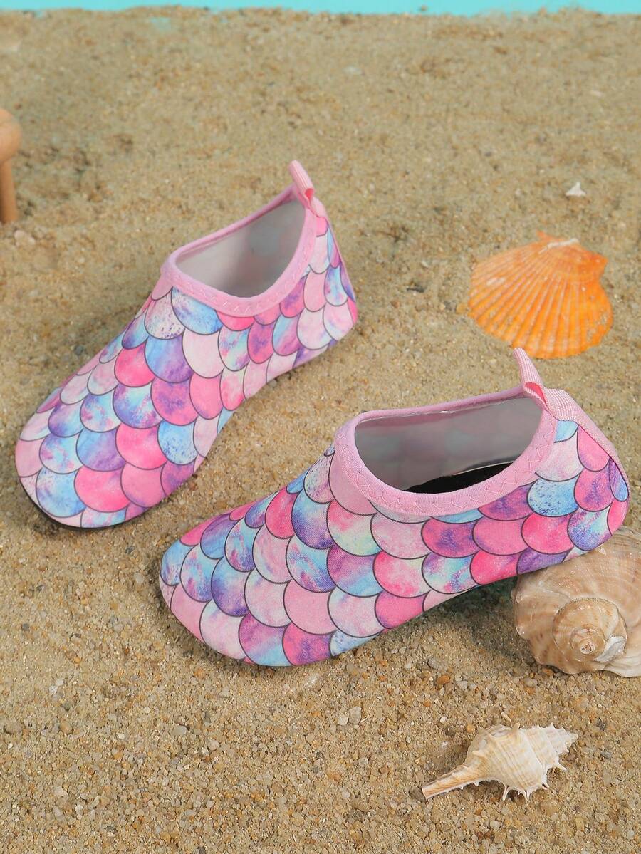 Pink kids quick-dry slip-on water shoes with breathable upper and non-slip TPR outsole.