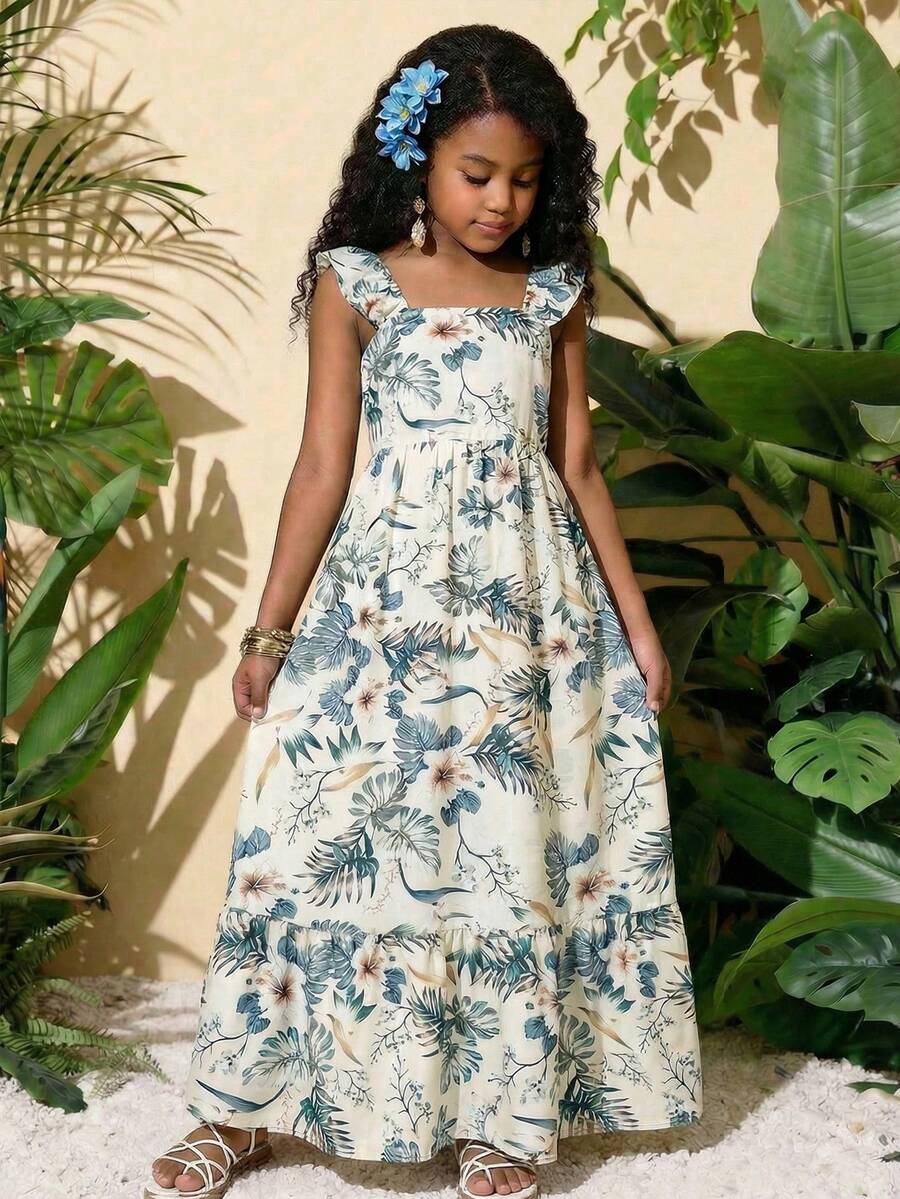 Blue floral print long vacation dress for tween girls featuring an A-line high waist silhouette with ruffle details and spaghetti straps.