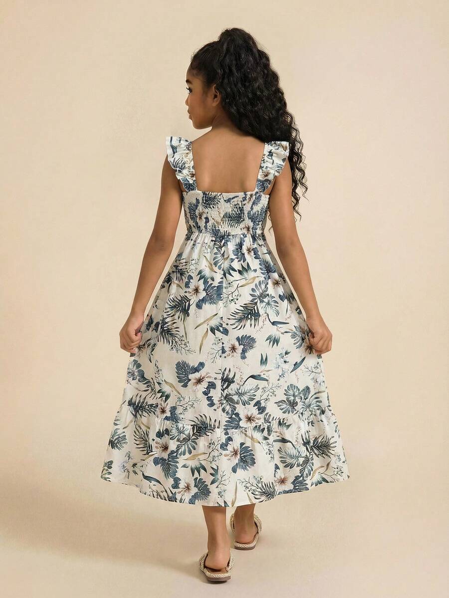 Blue floral print long vacation dress for tween girls featuring an A-line high waist silhouette with ruffle details and spaghetti straps.
