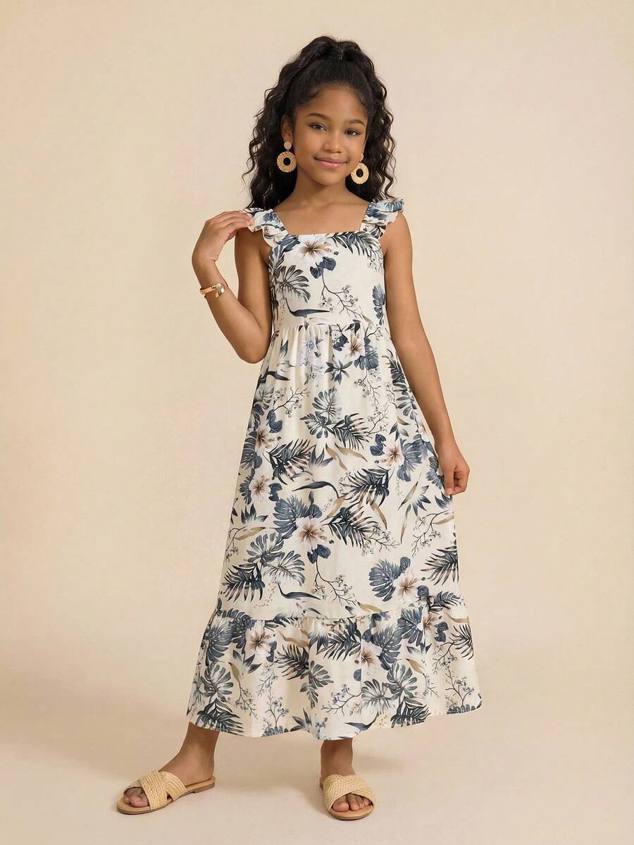 Blue floral print long vacation dress for tween girls featuring an A-line high waist silhouette with ruffle details and spaghetti straps.