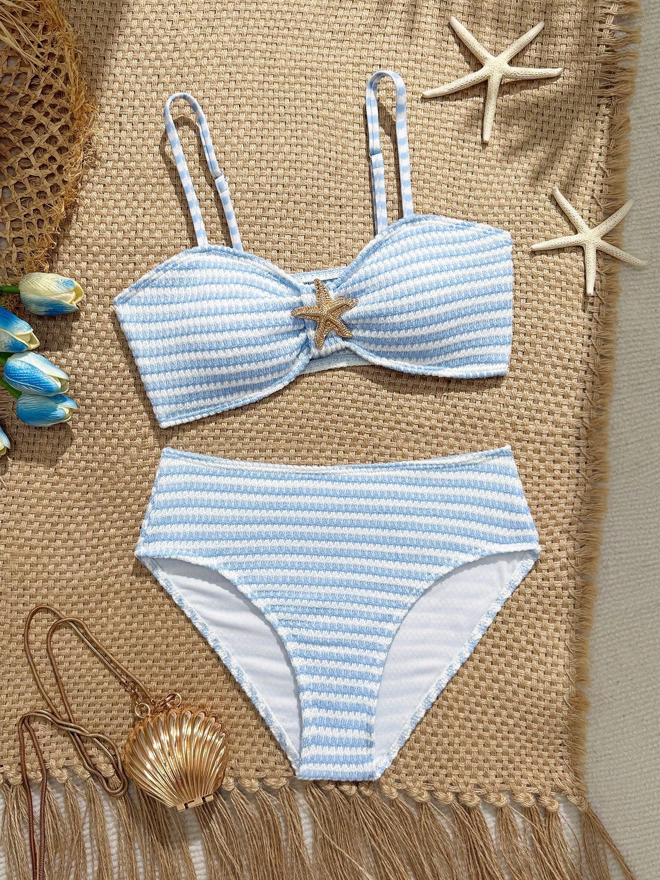 Tween girls pink and white striped two-piece bikini set with spaghetti strap bandeau top, starfish decor, and high waist swim bottoms for beach and vacation wear