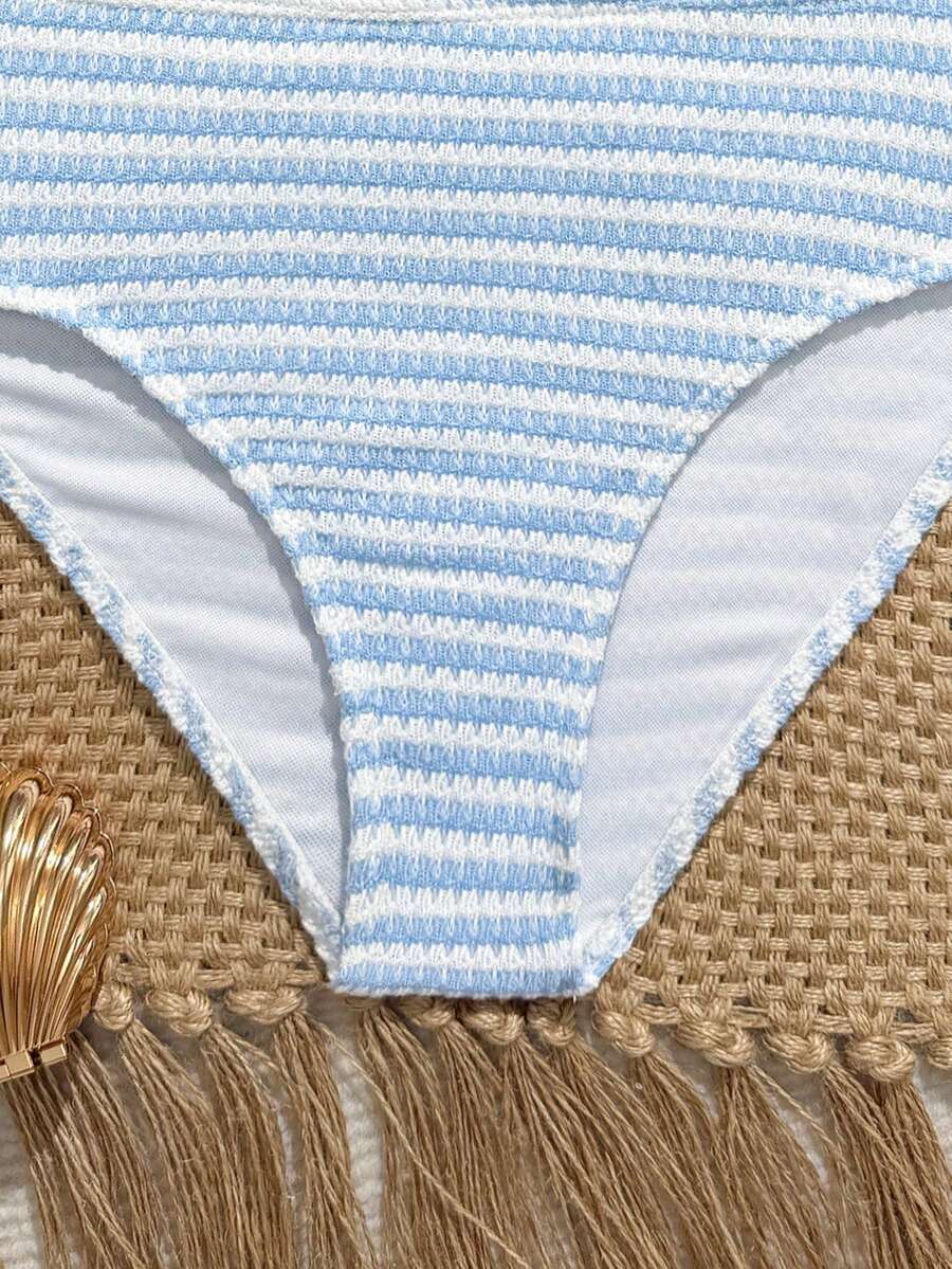 Tween girls pink and white striped two-piece bikini set with spaghetti strap bandeau top, starfish decor, and high waist swim bottoms for beach and vacation wear