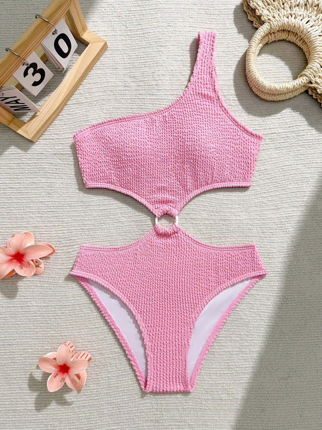 Mint blue tween girls one-piece swimsuit with asymmetrical neckline, cut-out detail, lined body, and high-stretch polyester blend fabric for vacation beachwear