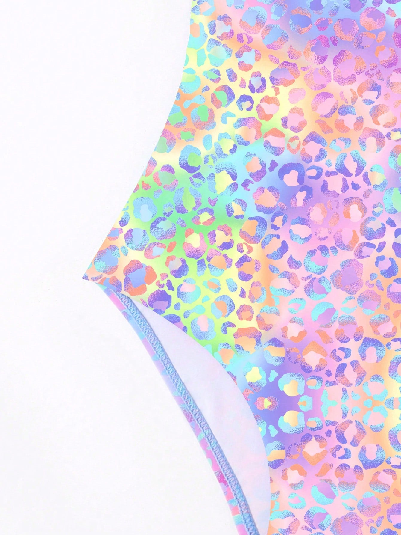 Girls' multicolor ombre leopard print one-piece swimsuit with scoop neck, ruffle detail, and criss-cross back design for summer pool wear.