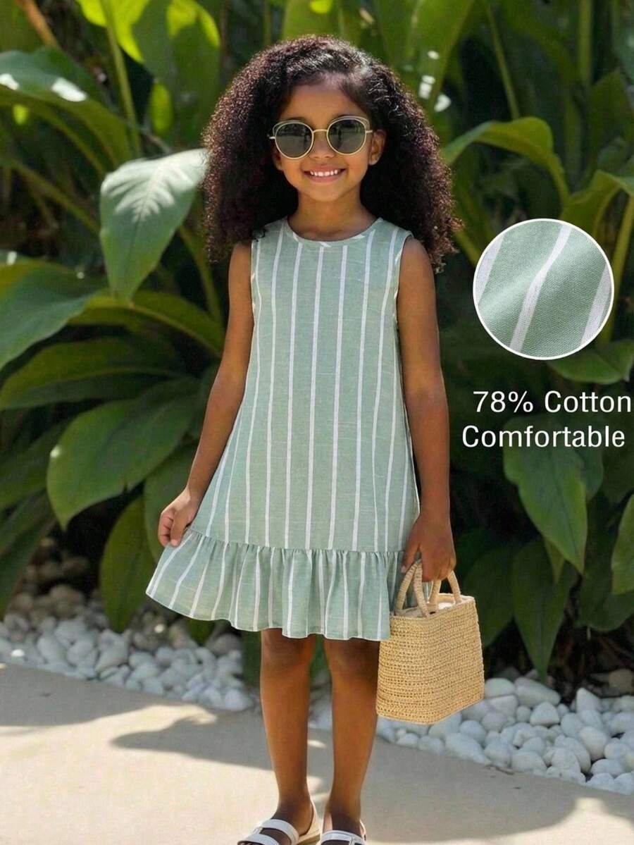 Tween girls blue denim effect sleeveless dress with round neck, button front details, and flounce hem.