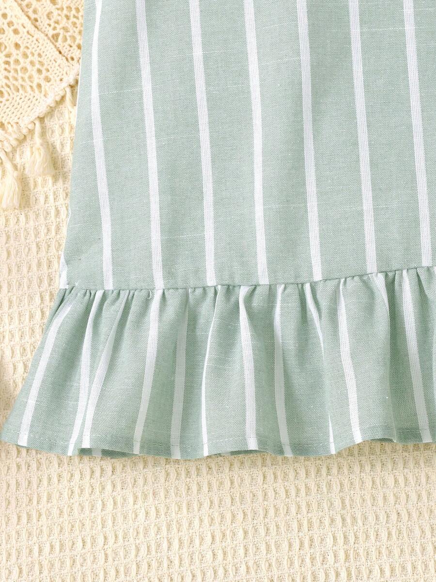 Tween girls blue denim effect sleeveless dress with round neck, button front details, and flounce hem.