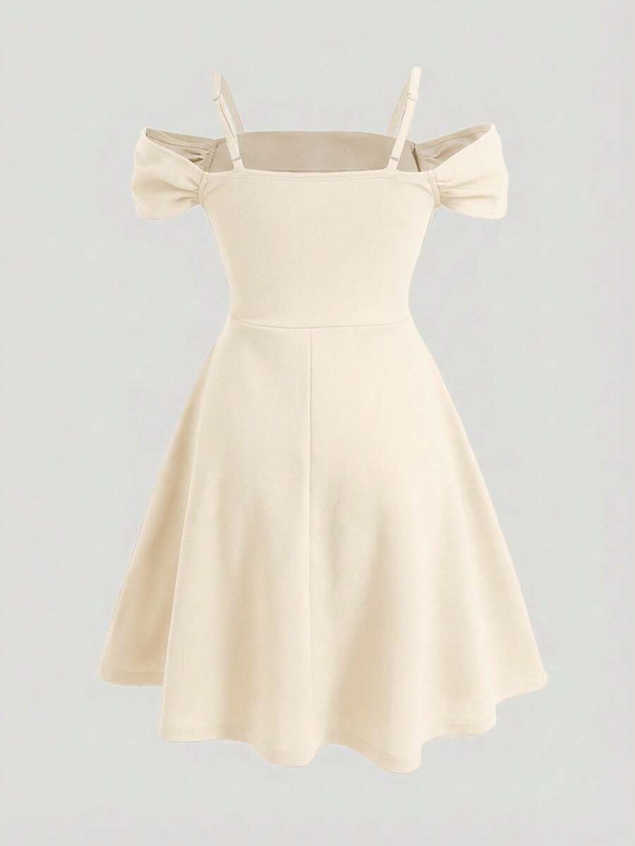 Apricot velvet A-line midi dress for tween girls featuring cold shoulder short sleeves, spaghetti straps, and a high waist.