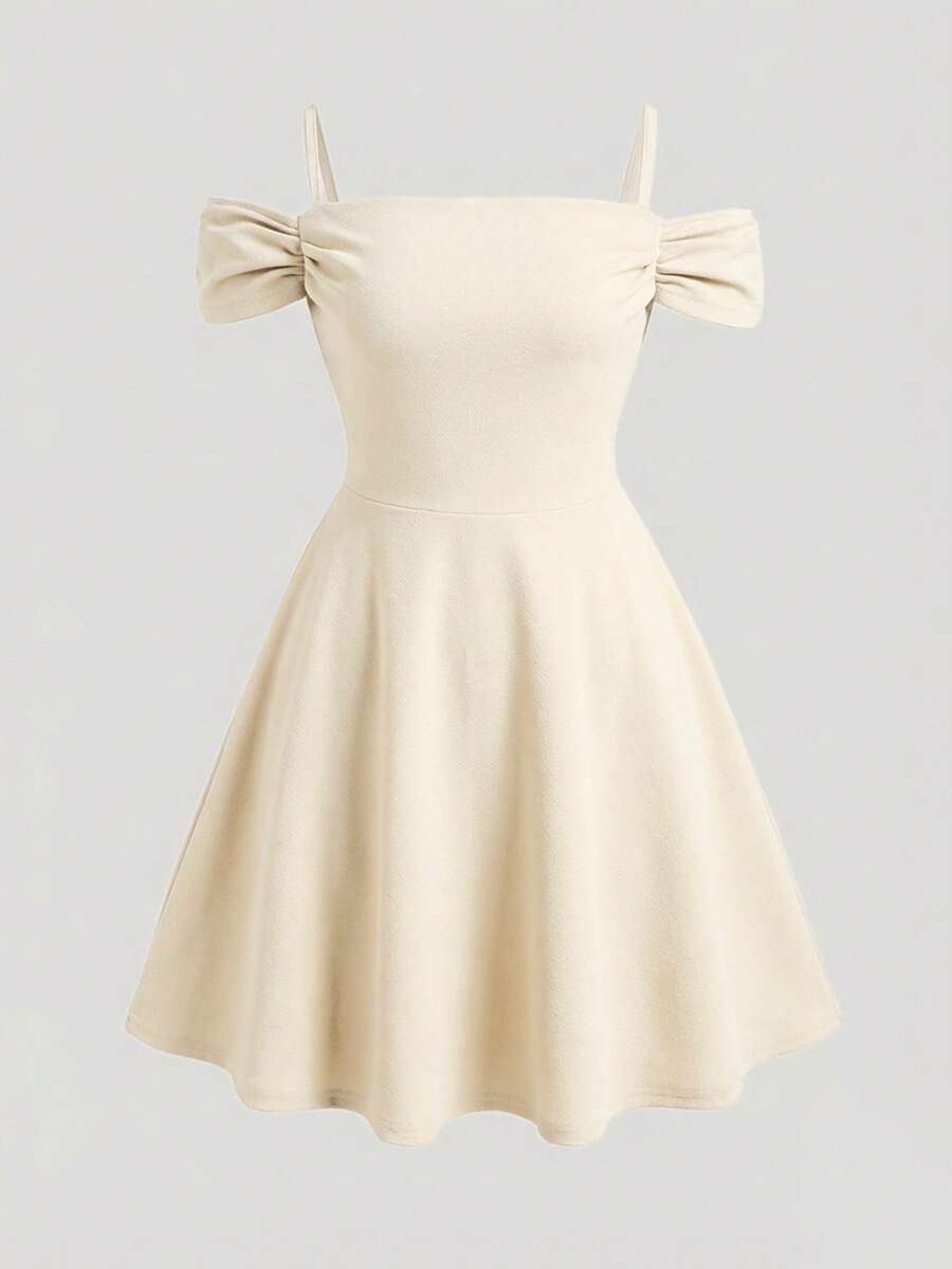 Apricot velvet A-line midi dress for tween girls featuring cold shoulder short sleeves, spaghetti straps, and a high waist.