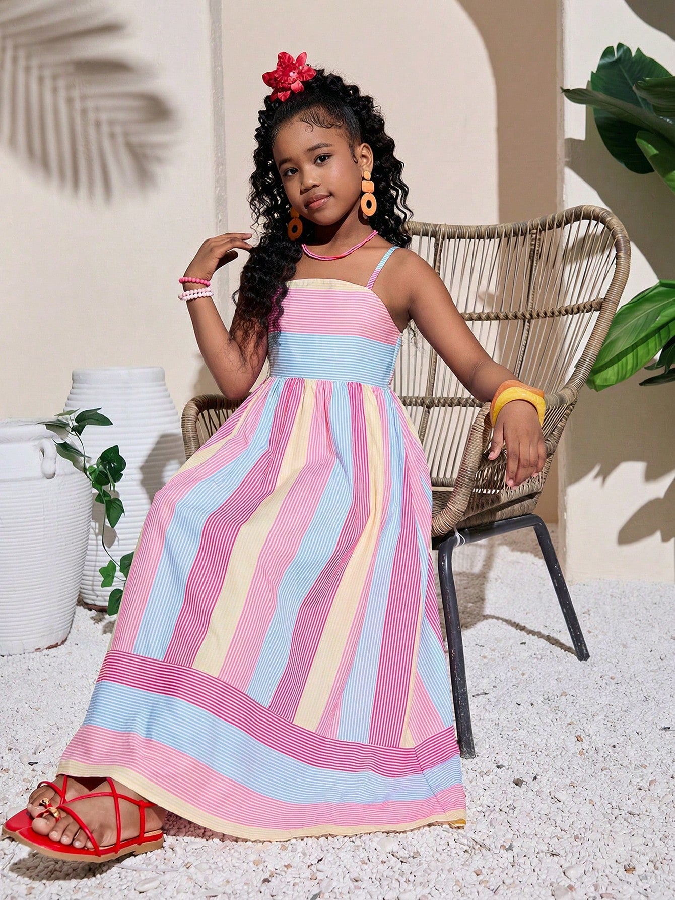 Tween girls striped spaghetti strap cami dress with high waist, shirred detail, zipper closure, sleeveless design, and flared long A-line silhouette for vacation wear.