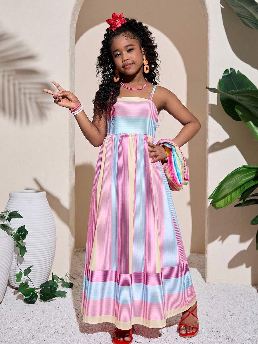 Tween girls blue striped summer camisole dress featuring spaghetti straps, high waist, flared hem, and back zipper detail.