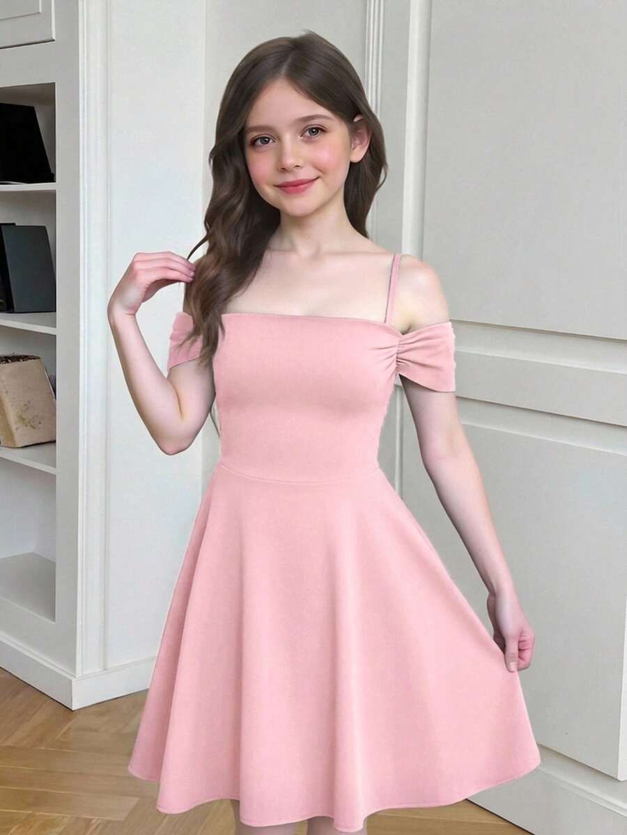 Apricot velvet A-line midi dress for tween girls featuring cold shoulder short sleeves, spaghetti straps, and a high waist.