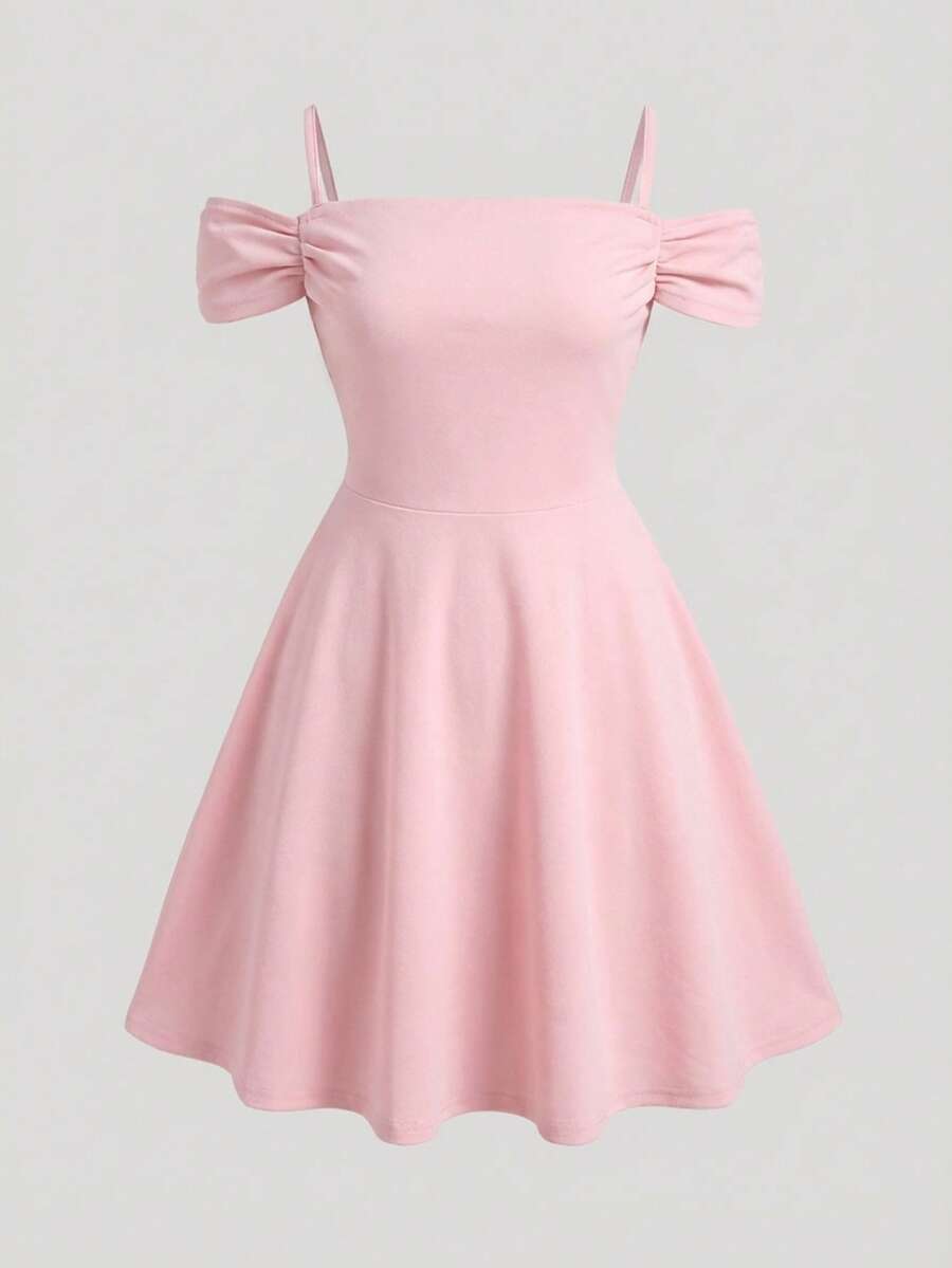 Apricot velvet A-line midi dress for tween girls featuring cold shoulder short sleeves, spaghetti straps, and a high waist.