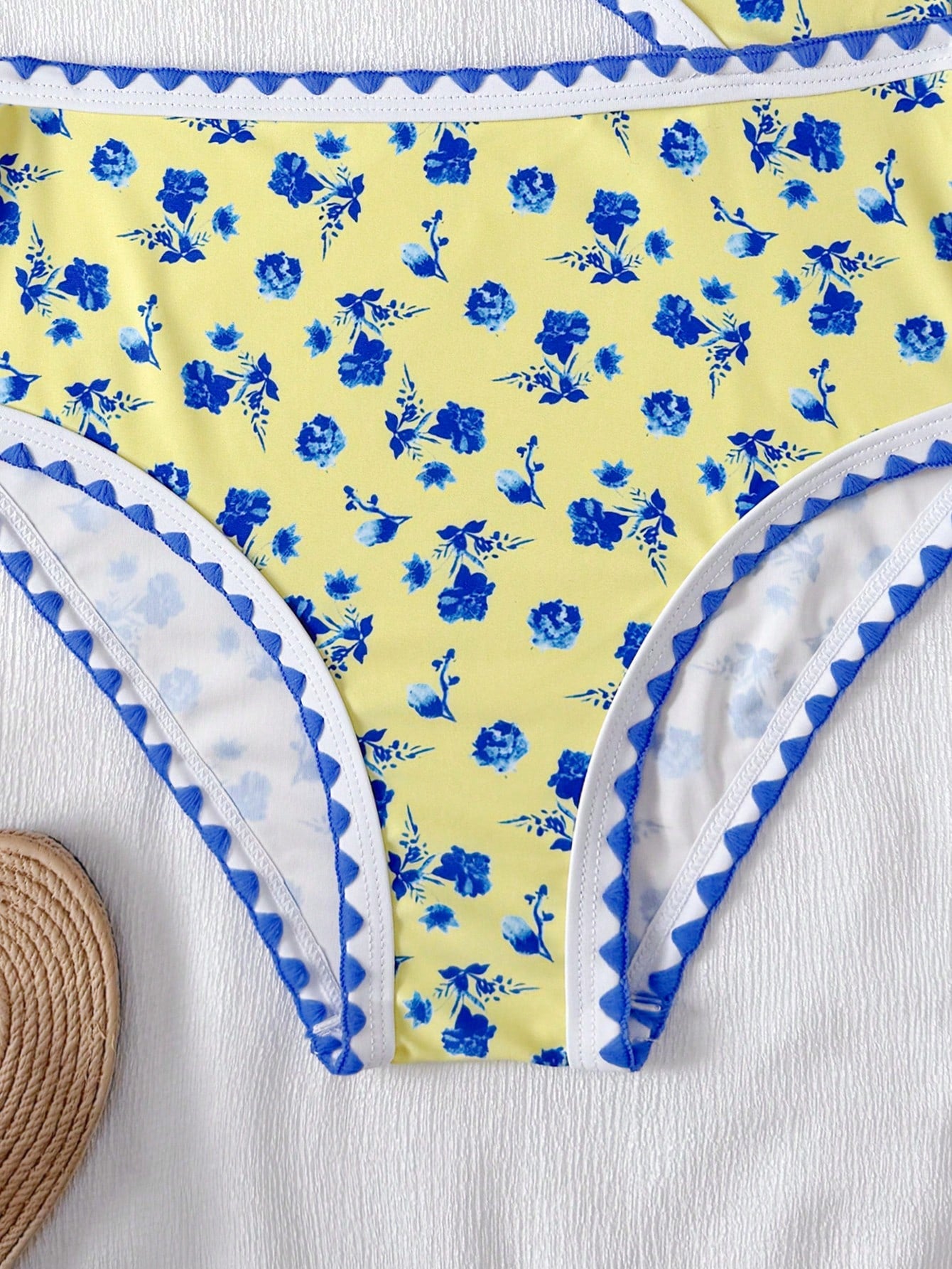 Tween girls one-piece swimsuit featuring an asymmetric neckline, pendant decor, plain design, wireless bra, high-cut bottom, and medium-stretch fabric.