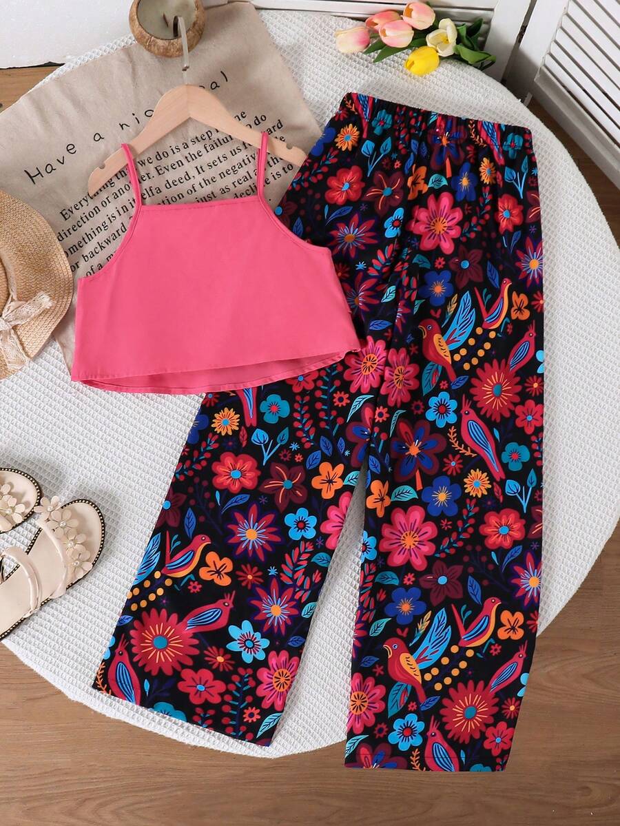 Tween girls blue 2-piece vacation outfit set featuring a tiered ruffle spaghetti strap camisole and loose high-waist pants.