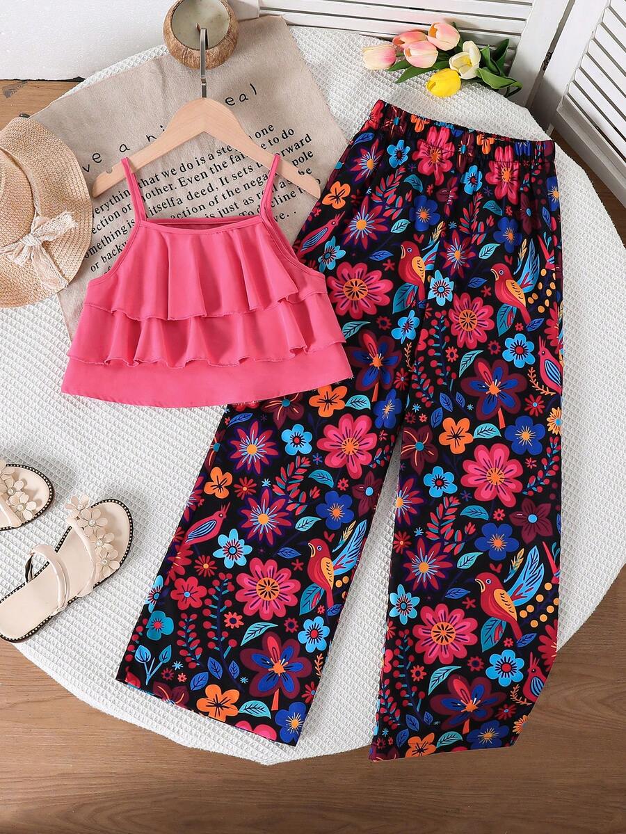 Tween girls blue 2-piece vacation outfit set featuring a tiered ruffle spaghetti strap camisole and loose high-waist pants.