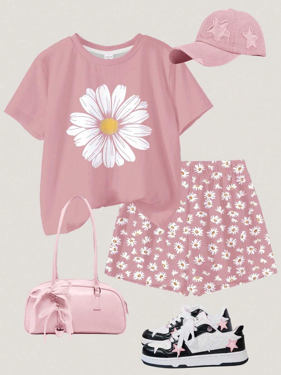 Tween girls 2-piece summer casual outfit featuring a multicolor seashell print short sleeve T-shirt with drop shoulders and matching loose fit shorts with pockets.
