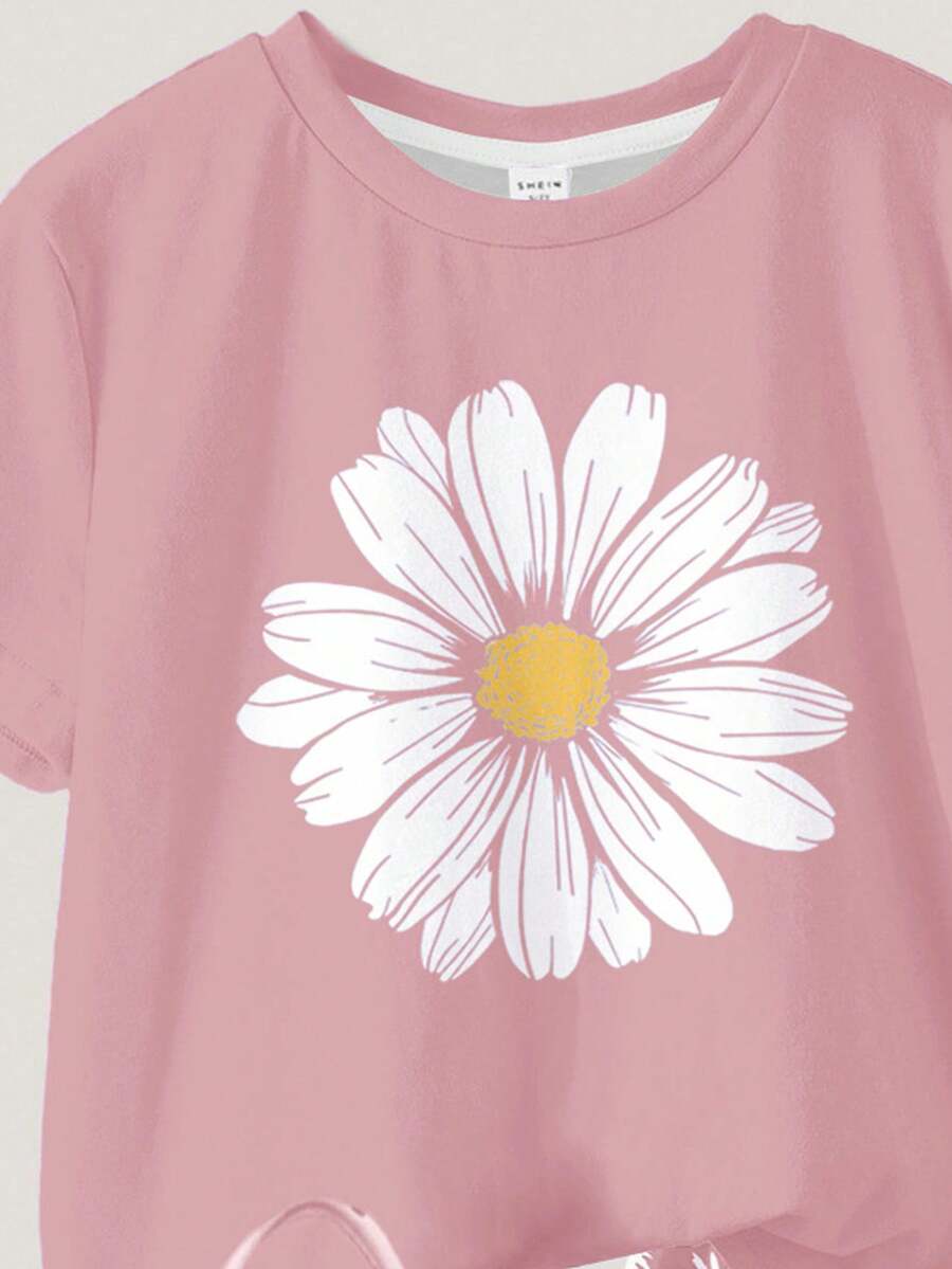 Tween girls 2-piece summer casual outfit featuring a multicolor seashell print short sleeve T-shirt with drop shoulders and matching loose fit shorts with pockets.