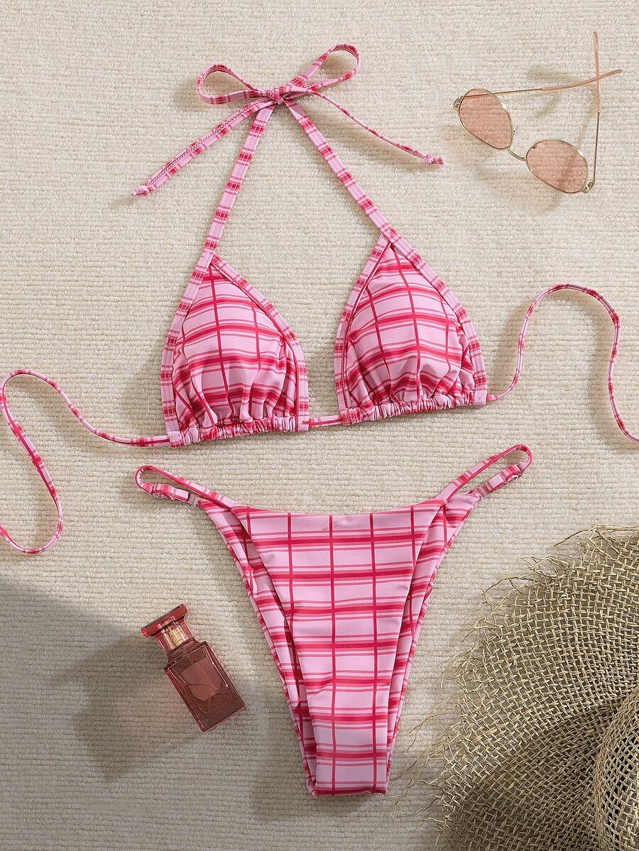Multicolor bohemian bikini set for women featuring a backless halter top with knot details and high cut swimsuit bottoms.