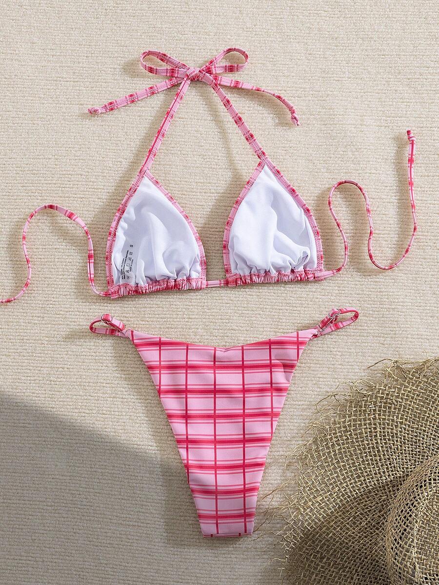 Multicolor bohemian bikini set for women featuring a backless halter top with knot details and high cut swimsuit bottoms.