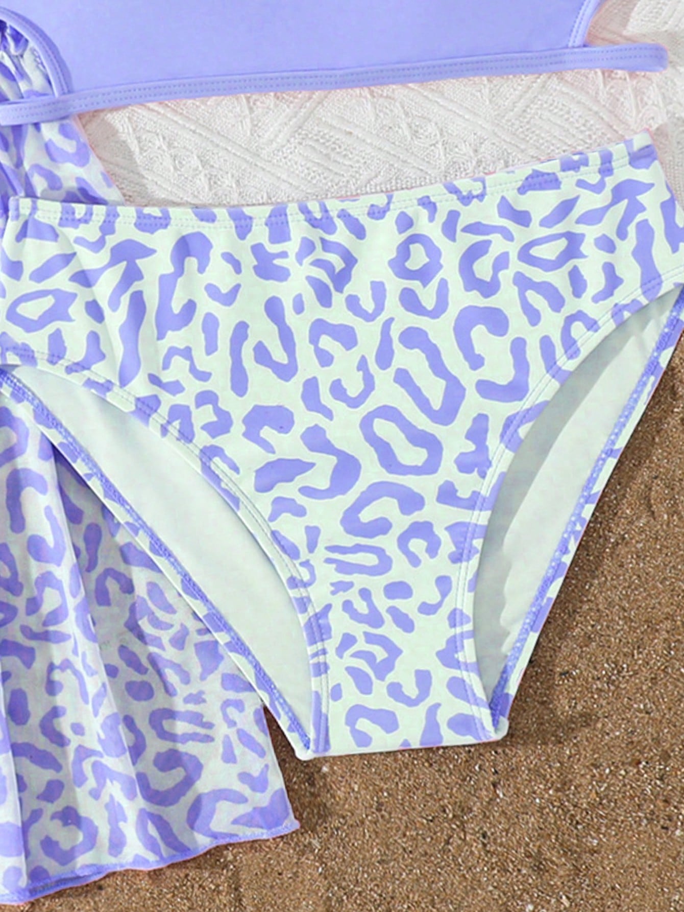 Tween girls 3-piece striped swimwear set featuring a tankini top, mid-waist bikini bottoms with a drawstring waist, and a matching kimono cover-up for beach or vacation wear.