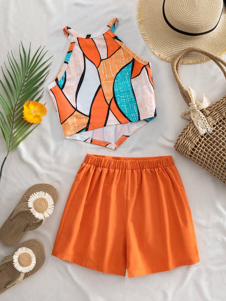 Girls 2-piece vacation outfit set with sleeveless halter knit crop top and graphic cargo shorts.