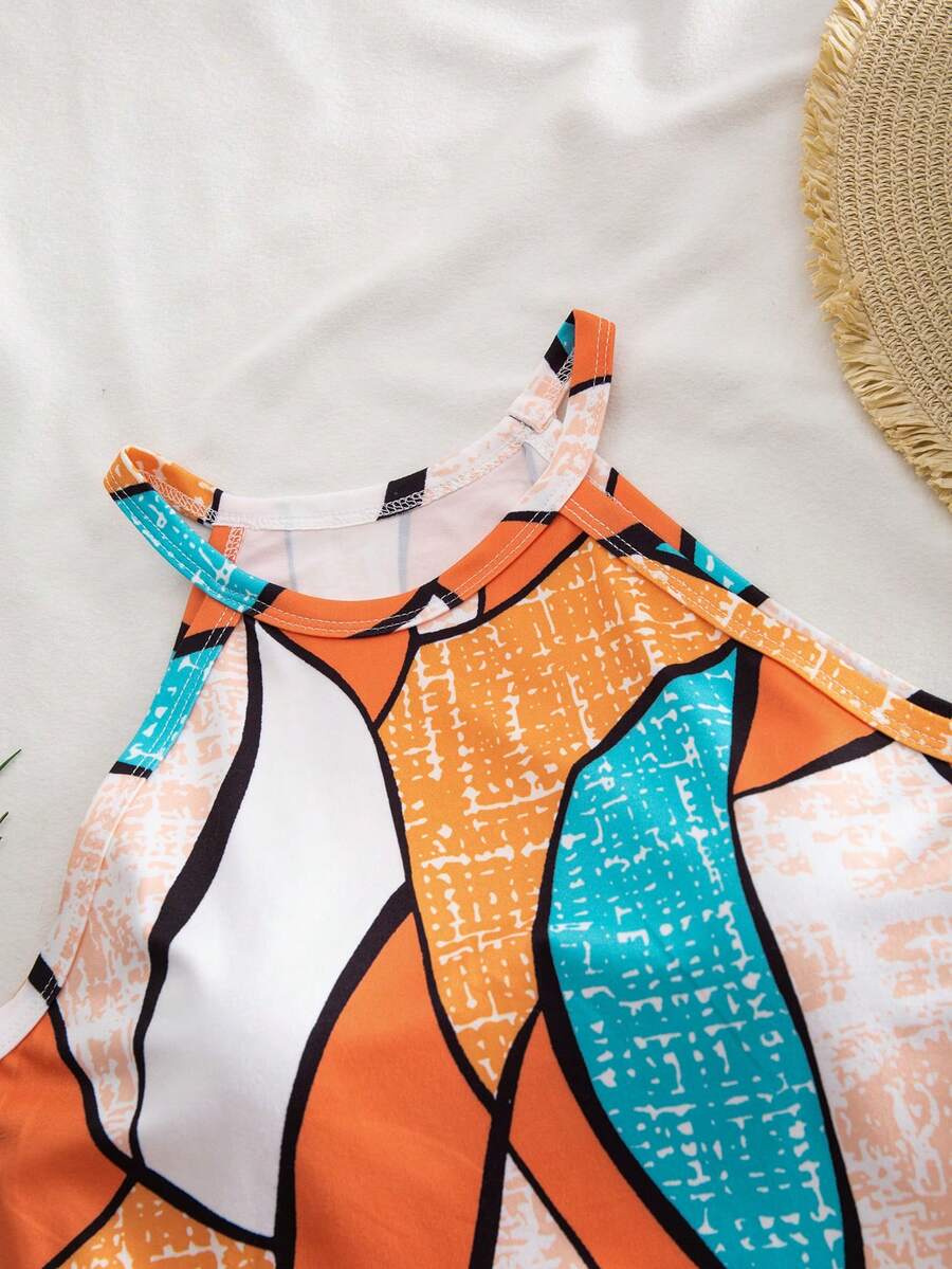Girls 2-piece vacation outfit set with sleeveless halter knit crop top and graphic cargo shorts.