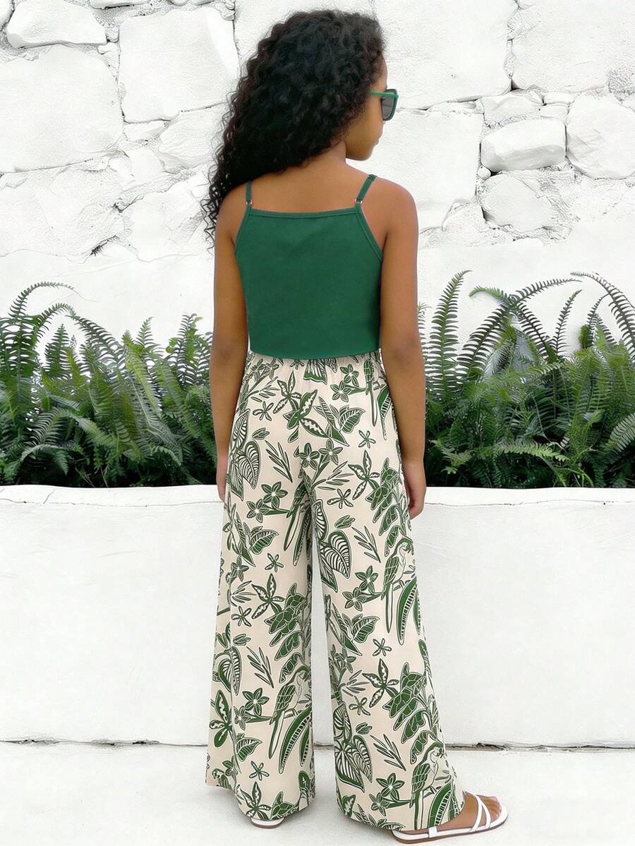 Tween girls blue 2-piece vacation outfit set featuring a tiered ruffle spaghetti strap camisole and loose high-waist pants.
