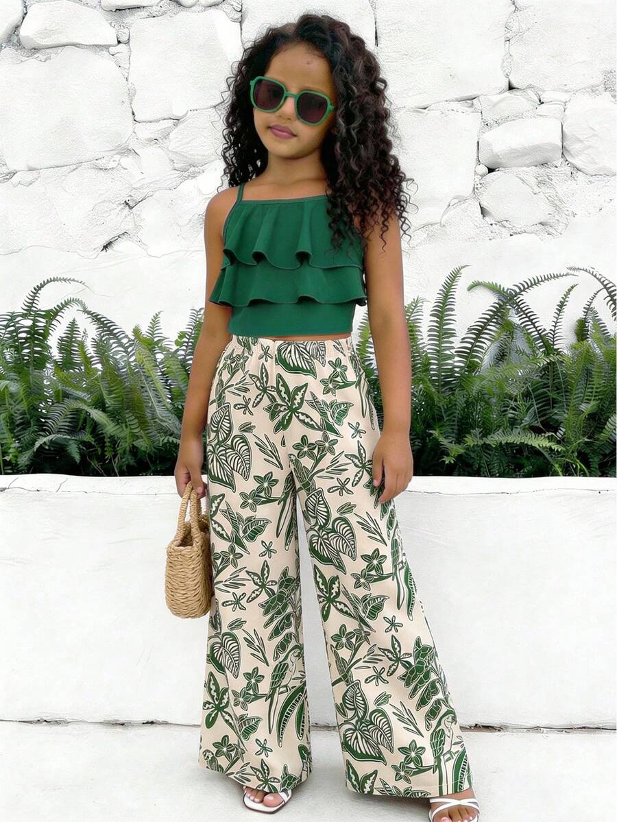 Tween girls blue 2-piece vacation outfit set featuring a tiered ruffle spaghetti strap camisole and loose high-waist pants.