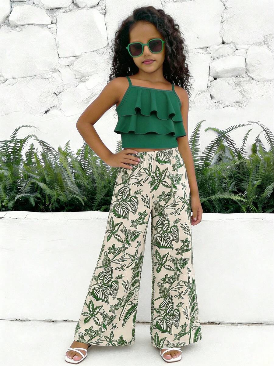 Tween girls blue 2-piece vacation outfit set featuring a tiered ruffle spaghetti strap camisole and loose high-waist pants.