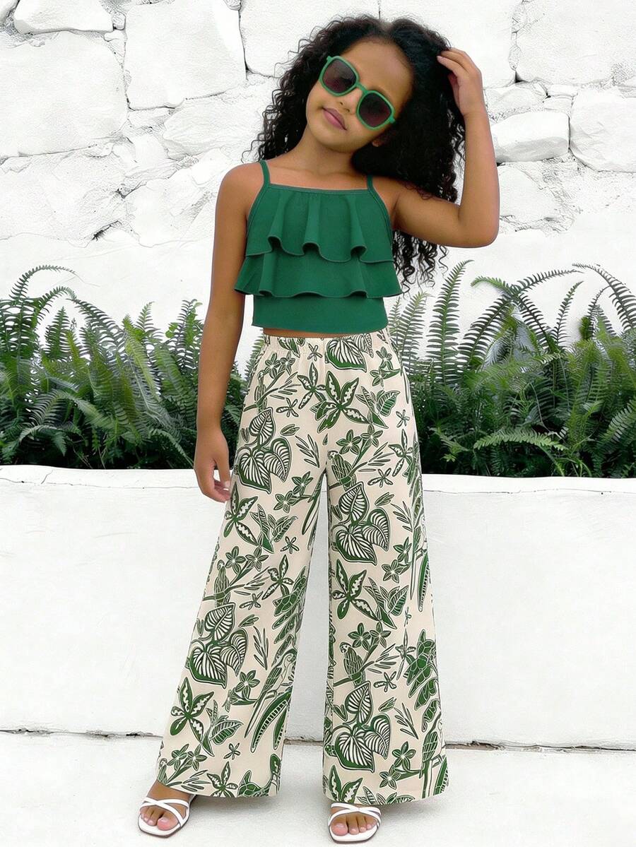 Tween girls blue 2-piece vacation outfit set featuring a tiered ruffle spaghetti strap camisole and loose high-waist pants.