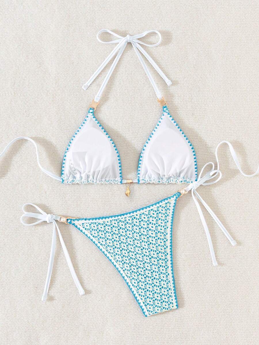 Women's triangle bikini set with contrast lace wireless bra top and ultra high waist tie side bottoms.