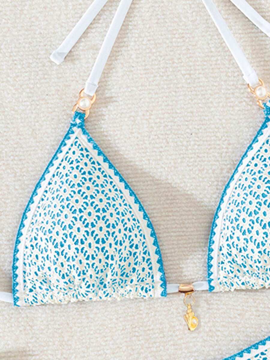 Women's triangle bikini set with contrast lace wireless bra top and ultra high waist tie side bottoms.
